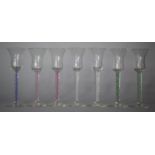 A Collection of Seven Coloured Double Airtwist Hand Blown Cordial Glasses