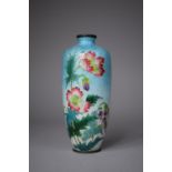 An Oriental Enamelled Vase Decorated With Flowers on Blue Ground, 15cm high