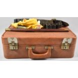 A Vintage Travelling Case Together with Leather Cartridge Belt and Gun Cleaning Kit