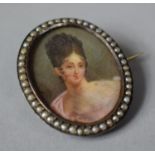 A Hand Painted Victorian Miniature of Lady in White Metal and Seed Pearl Oval Mount and Formed