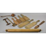 A Collection of 19th Century and Later Treen Kitchen Implements to Include Butter Pats, Juicer,