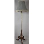 A Nice Quality Walnut and Brass Standard Lamp with Hexagonal Support on Tripod Base, Complete with