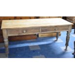 A 19th Century Plank Top Two Drawer Scullery Table on Turned Supports, 180cm wide