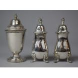 A Pair of Walker Silver Plated Pepper Pots, 7.5cm high together with a Silver Vase Shaped Pepper,