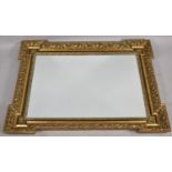 A Large and Heavy Moulded Gilt Framed Wall Mirror, 91cm x 71cm