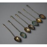 A Collection of Seven Far Eastern White Metal Spice Spoons