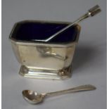 A Small Garrard Silver Salt with Cobalt Blue Glass Liner and Two Silver Salt Spoons