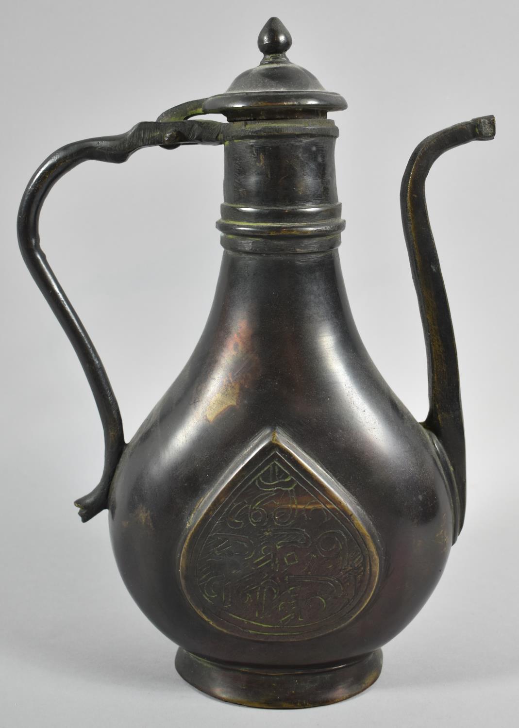 A Heavy Oriental Patinated Bronze Coffee Pot with Hinged Lid and Tapering Square Spout, 28cm high