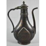 A Heavy Oriental Patinated Bronze Coffee Pot with Hinged Lid and Tapering Square Spout, 28cm high