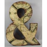 A Large Metal Wall Hanging "&" Sign Decorated with Atlas, 62cm high