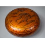A Chinese Wooden Painted and Lacquered Circular Lidded Food Box with Snarling Tiger, the Inner
