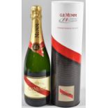 A Bottle of Mumm Cordon Rouge Champagne in Formula One Presentation Tube