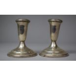 A Pair of Weighted Sterling Silver Candlesticks, 10.25cm high (One AF)