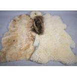 Two Sheepskin Rugs, Sheep Skin Ladies Hat and Faux Fur Stole