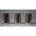 A Set of Three Miniature Tankards the Base Stamped Silver, BS & Co., 4.5cm high