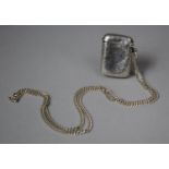 A Silver Vesta on White Metal Chain