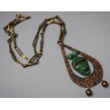 A Mexican Green Stone and Copper Necklace with Carved Mask