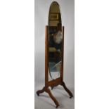 A Mid 20th Century Cheval Mirror with Bevelled Oval Glass
