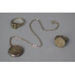 A Continental Silver Ring, Silver Threepenny Bit and a Silver Locket