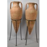 A Pair of Terracotta Amphoras in Metal Tripod Supports, Amphoras 75cm high