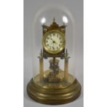 An Early 20th Century Angemeldet Patent Brass Torsion Clock with Glass Dome and Circular Base, 26.