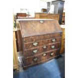 A George III Mahogany Bureau with Fall Front to Shaped and Fitted Interior with Secret Compartments,