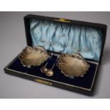 A Pair of Cased Shell Shaped Silver Salts with Spoons, Case Hinges Requiring Attention
