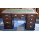 A Modern Kneehole Writing Desk with Tooled Leather Top Having Centre Drawer Flanked by Four Short