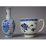 An Oriental Blue and White Miniature Vase, 10cm high Together with a 19th Century Teacup