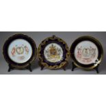 A Sevres Châteaux Des Tuileries Cobalt Blue and Gilt Bordered Cabinet Plate Decorated with Cherubs