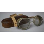 A Metal Cased Pair of Vintage Goggles