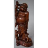 An Oriental Carved Wood Okimono of Standing Laughing Buddha and Children, Late 19th/20th Century,