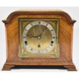 An Edwardian Walnut Cased Westminster Chime Mantle Clock by Elliot, 30cm wide