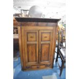 A 19th Century Crossbanded Oak and Mahogany Wall Hanging Corner Cabinet with Centre Drawer Flanked