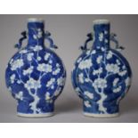 A Pair of Chinese Blue and White Prunus Pattern Moon Flasks, Kangxi Four Character Mark to Base,