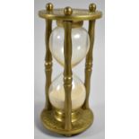 A Reproduction Brass Hourglass, 16cm high