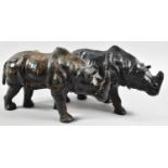 A Pair of Leather Studies of Rhinos, 34cm long