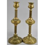 A Pair of Gilt Brass Weighted Candlesticks, 24.5cm high