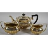 A Three Piece Silver Plated Tea Service