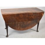 A 19th Century Oak Drop Leaf Oval Topped Dining Table on Pad Feet, 121cm wide