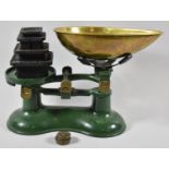 A Set of Green Enamelled Scales with Brass Pans and Various Weights