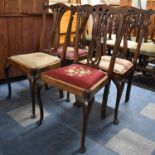 A Set of Four 19th Century Mahogany Framed Dining Chairs with Tapestry Pad Seats and Pierced Vase