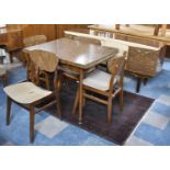 A 1960's Formica Dining Room Suite Comprising Extending Table, Four Matching Chairs and Sideboard