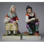 A Pair of Staffordshire Figures, Seated Lady and Gent