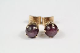 A Pair of 14ct Yellow Gold Star Sapphire Ear Studs