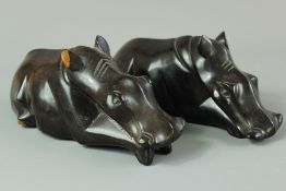 A Pair of Carved Hippopotamus