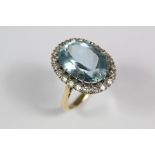 An 18ct Yellow White Gold and Aquamarine Ring