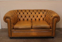 A Chesterfield-style Sofa