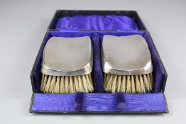 A Pair of Silver Brushes