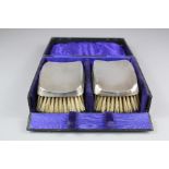 A Pair of Silver Brushes